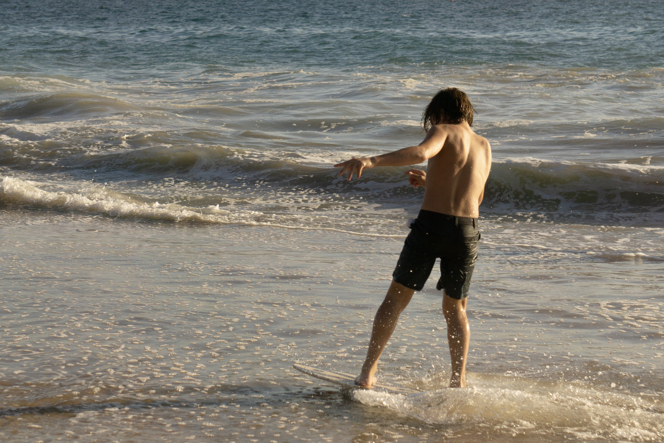 kid skim boarding